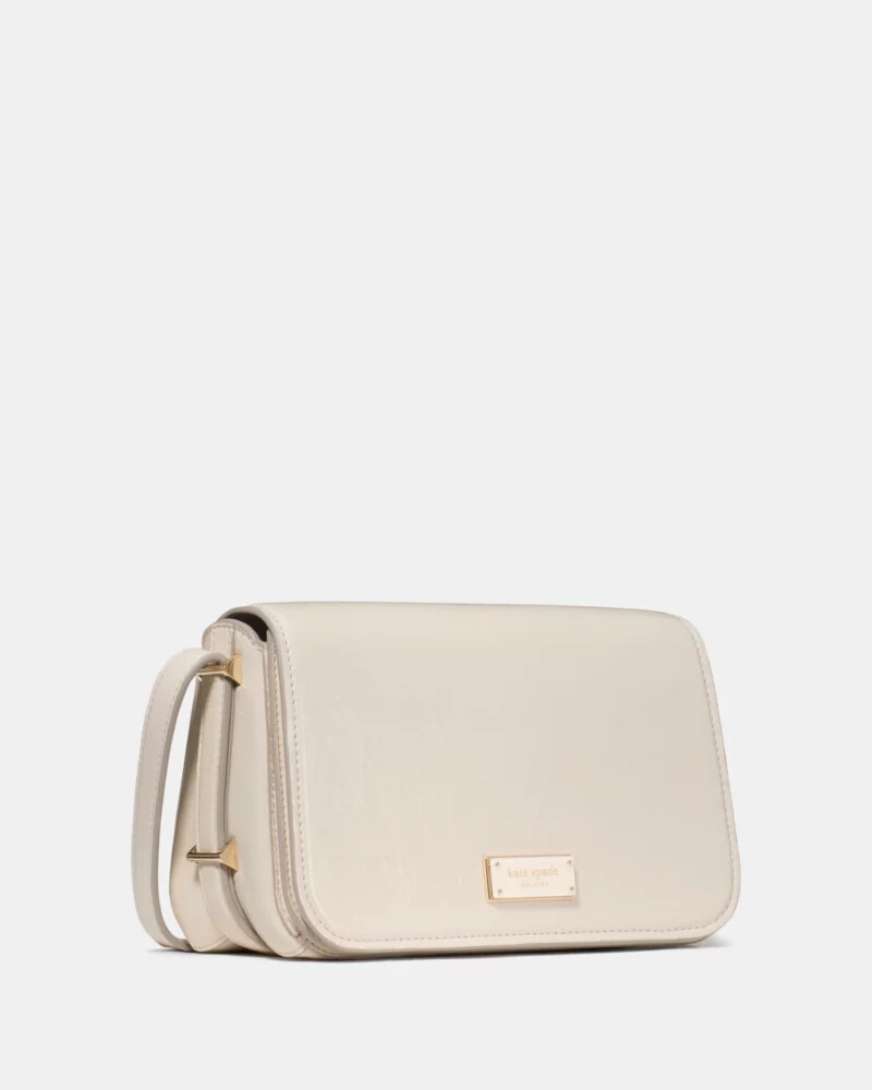 liv crinkle patent crossbody bag cashew milk