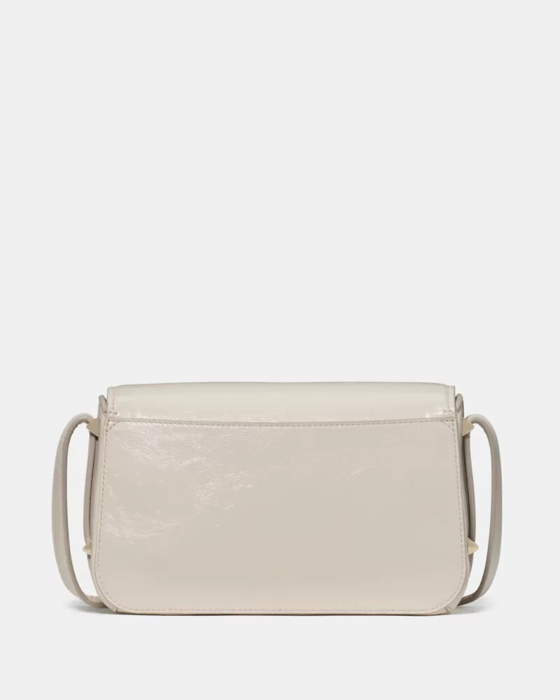 liv crinkle patent crossbody bag cashew milk