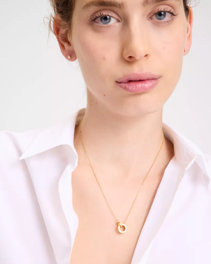 set in stone interlink pendant gold clear